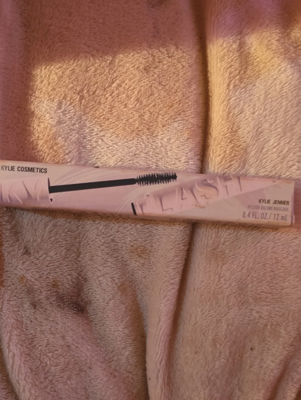 Accent: Unknown Makeup Item on Blanket
